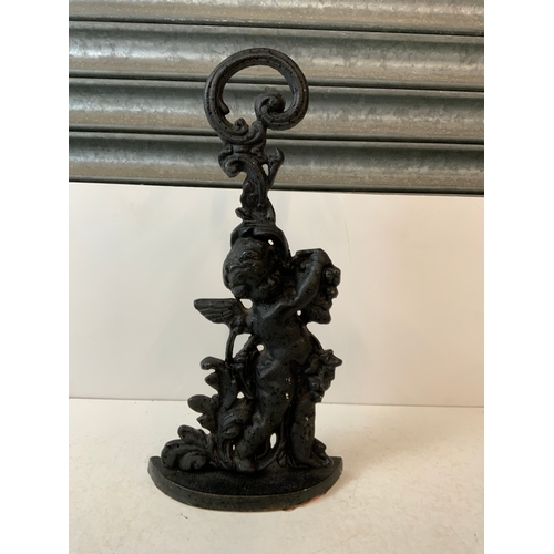 348 - Cast Iron Cupid Door Stop