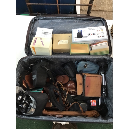 683 - Suitcase and Contents - Cameras and Equipment etc