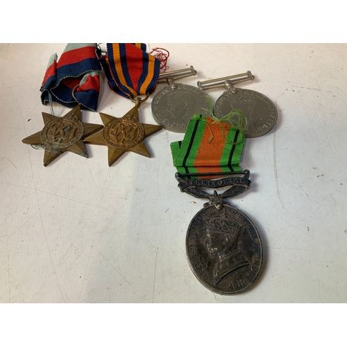 837 - Medals to include Territorial Army to Sgt  E J Talbot