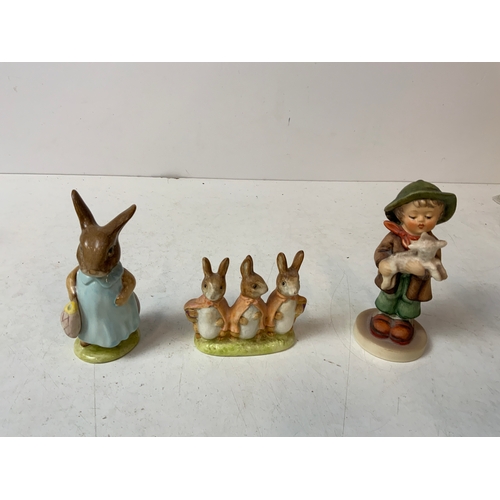 816 - Beatrix Potter Figurines and Goebel Figure