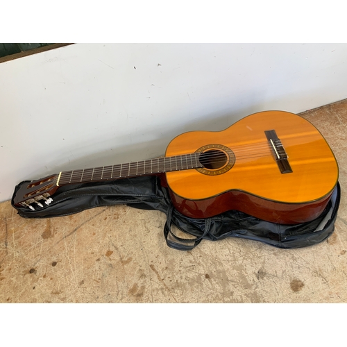 580A - Acoustic Guitar