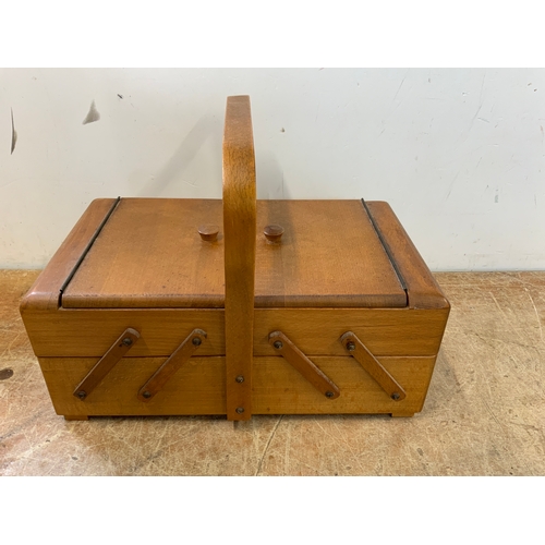 129 - Cantilever Sewing Box and Contents - Cotton Reels