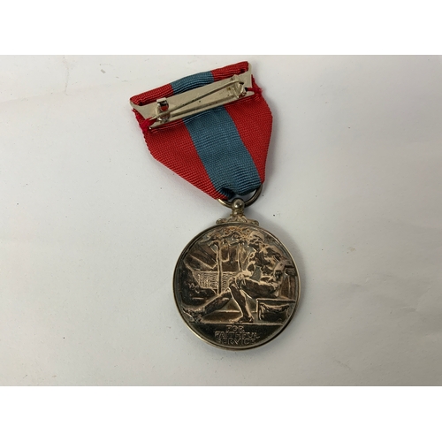 655 - Imperial Service Medal and Salvation Army Tambourine