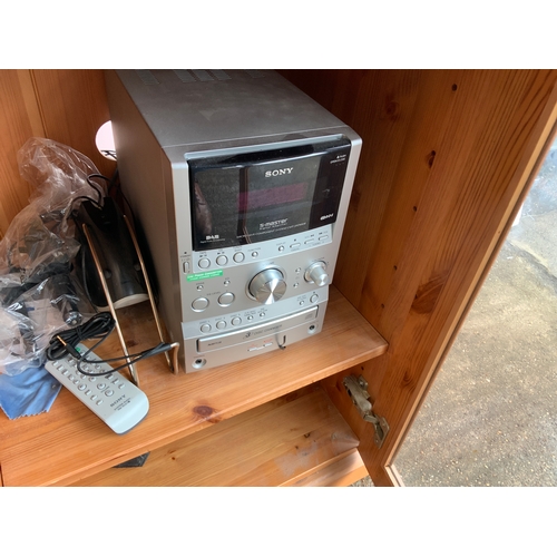 835 - Sony Stereo in Cabinet - Buyer to Remove Lot in its Entirety