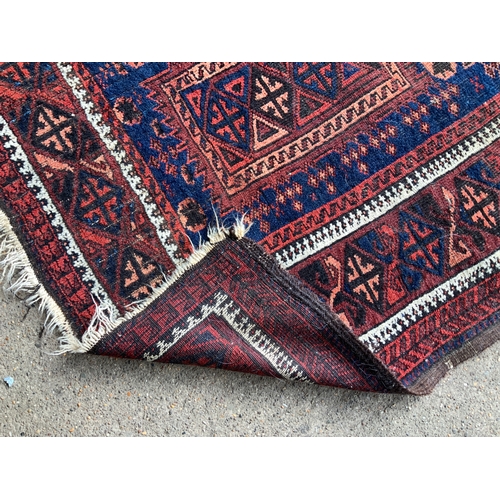 302 - Patterned Rug - 135cm x 205cm
