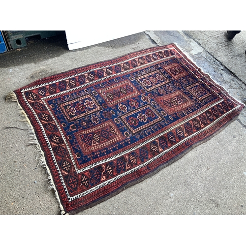 302 - Patterned Rug - 135cm x 205cm