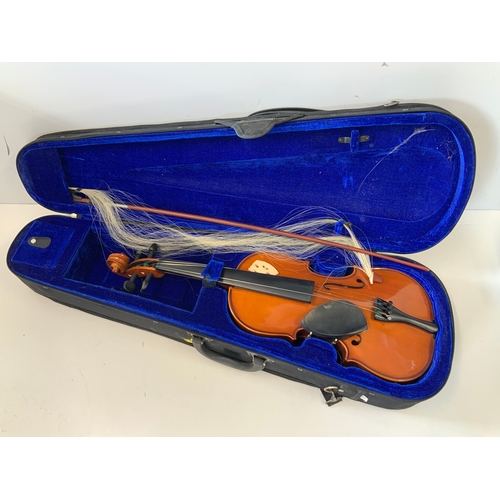 585 - Cased Violin