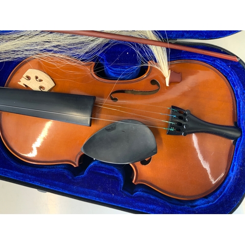 585 - Cased Violin