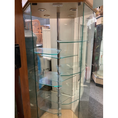 754A - Good quality illuminated revolving, hexagonal display cabinet. Buyer to dismantle and remove