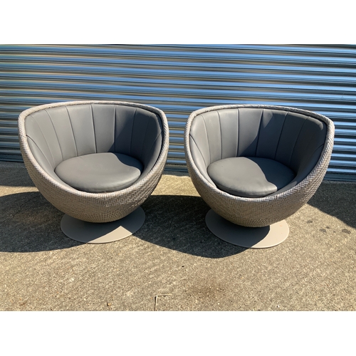 127 - Rattan Garden Swivel Chairs