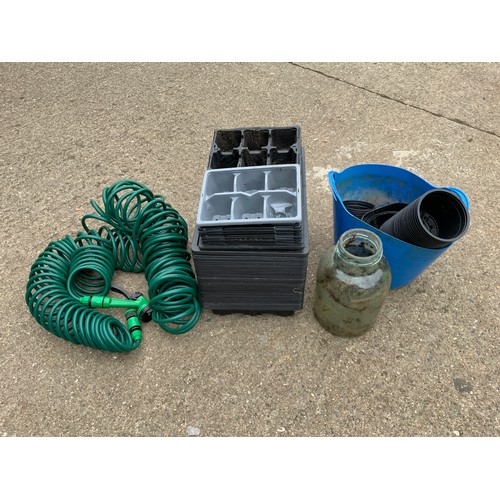 65 - Garden Hose and Seed Trays etc