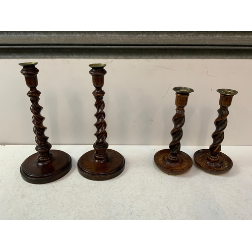 204 - 2x Pairs of Treen Candlesticks