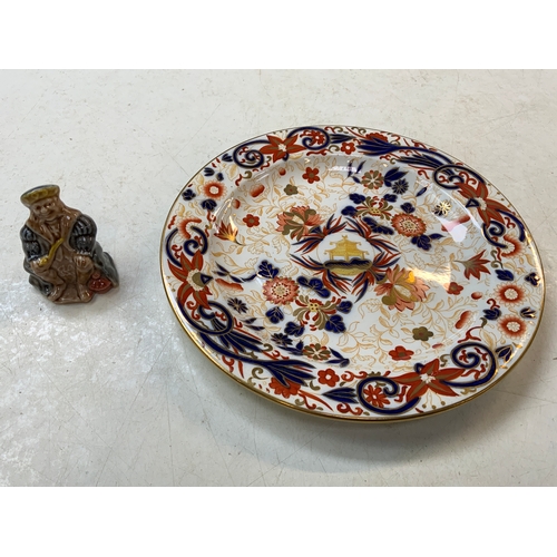 176 - Decorative Plate and Wade Figure