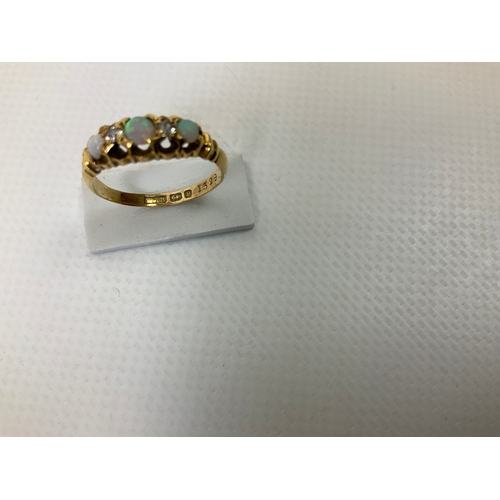 58 - 18ct Gold Opal and Diamond Ring - Size M