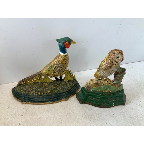 422 - 2x Cast Iron Door Porters