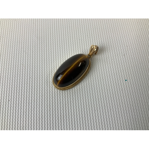 150 - Tigers Eye Pendant in 9ct Gold Mount