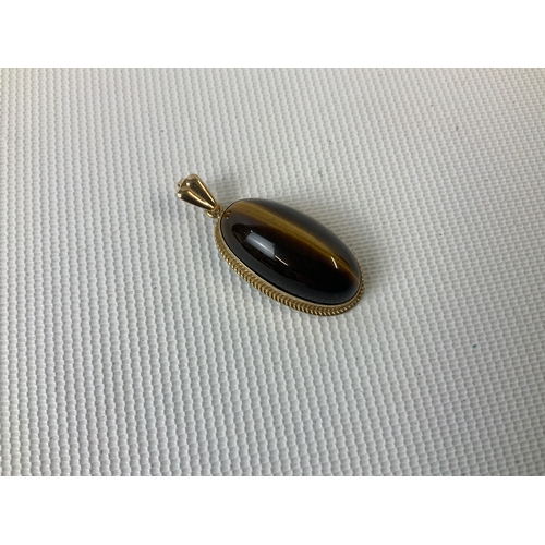 150 - Tigers Eye Pendant in 9ct Gold Mount