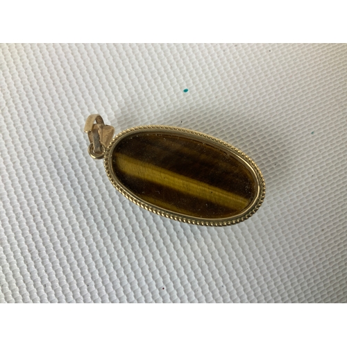150 - Tigers Eye Pendant in 9ct Gold Mount