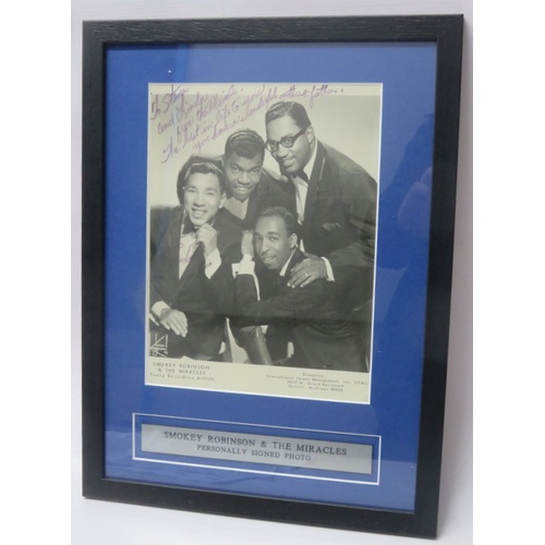 9 - Smokey Robinson and the Miracles - signed black and white photograph, fully signed with dedication, ... 