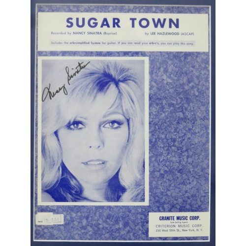 13 - Nancy Sinatra - signed Sugar Town sheet music, framed and glazed. 29.5cms x 22cms