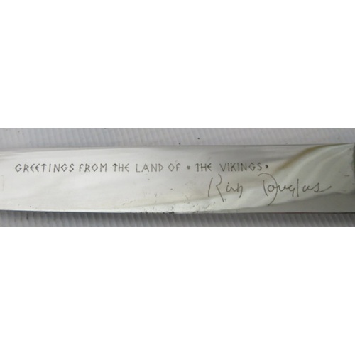 286 - Kirk Douglas A presentation letter opener from the 1958 film “The Vikings” with Viking longboat drag... 