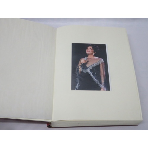 291 - Photograph book housing 47 photographs of Liza Minnelli performing live on last page written For Liz... 