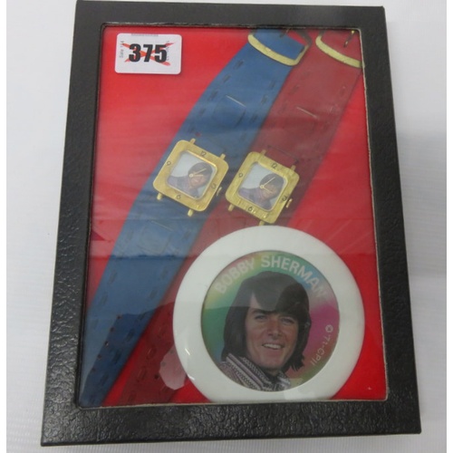 325 - Small collection of Bobby Sherman items Lunch Tin, Tour Programme, Watches, Badges & Promo Photograp... 