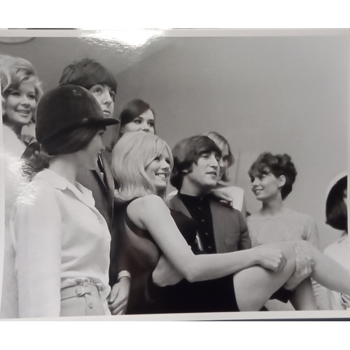 283 - Eight black and white 8×10 photographs of John And Paul with models