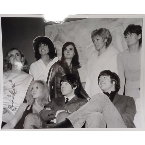 283 - Eight black and white 8×10 photographs of John And Paul with models