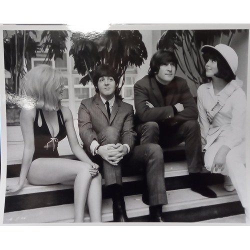 283 - Eight black and white 8×10 photographs of John And Paul with models