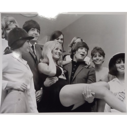 283 - Eight black and white 8×10 photographs of John And Paul with models