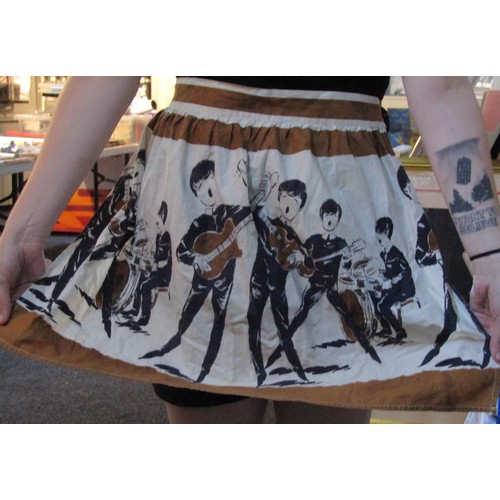 300 - Ladies Apron featuring Beatles style figures, UK 1964