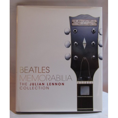 307 - The Beatles Memorabilia: The Julian Lennon Collection Hardback book, signed by Julian Lennon