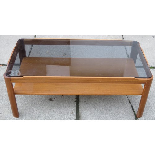 103 - 20th century teak glass topped coffee table. Approx. 36cm H x 67.5cm W x 43.5cm D