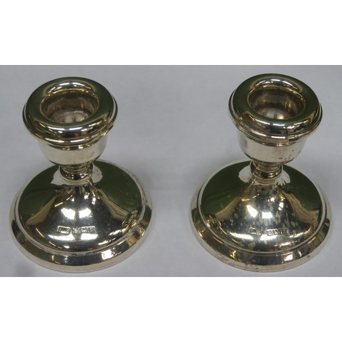 270 - Pair of small Hallmarked silver candle stands, Birmingham assay by Toye, Kenning and Spencer dated 1... 