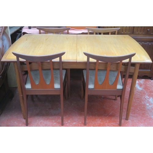 12 - G Plan mid 20th century teak extending dining table with fold out leaf and four chairs. Approximatel... 