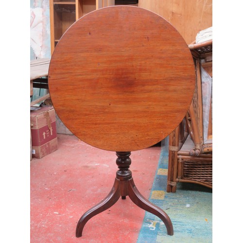 50 - Late 19th century mahogany tilt top table on tripod supports. Approximately. 75cm H x 69cm Diameter