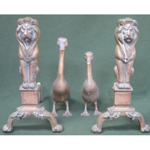 243 - Pair of vintage brass lion form fireside andirons on claw supports, plus two graduated ducks