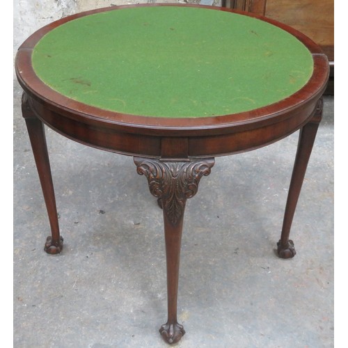 13 - Early 20th century piecrust edged mahogany fold over games table on ball and claw supports, with gre... 