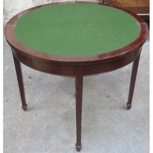 176 - Late 19th/early 20th century mahogany piecrust edged fold over games table, with green felt interior... 