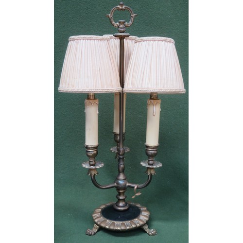95 - Early 20th century brass three sconce table lamp, with shades, on claw supports. Approx. 52cms High