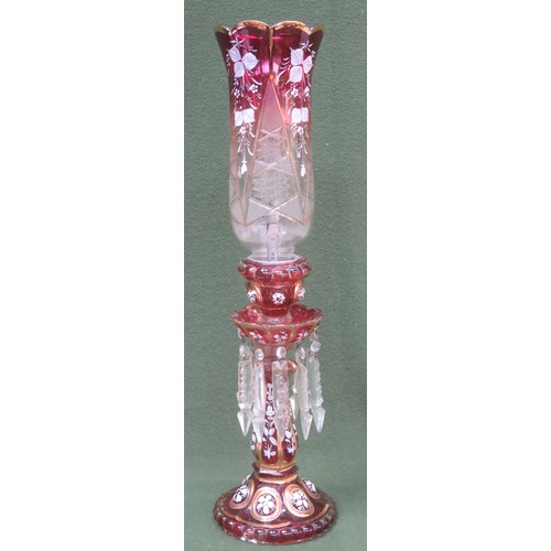 97 - Victorian cranberry coloured glass sectional table lamp and shade, with hand painted and gilded flor... 