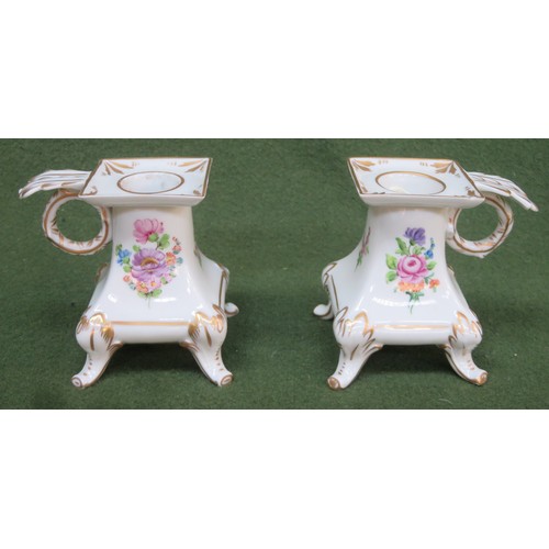 108 - Pair of Dresden hand painted and gilded floral decorated ceramic candle holders. Approx. 9cms High