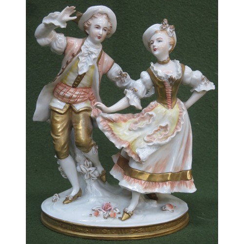 109 - Sitzendorf hand painted and gilded ceramic figure group, depicting a lady and gent. Approx. 20cms Hi... 