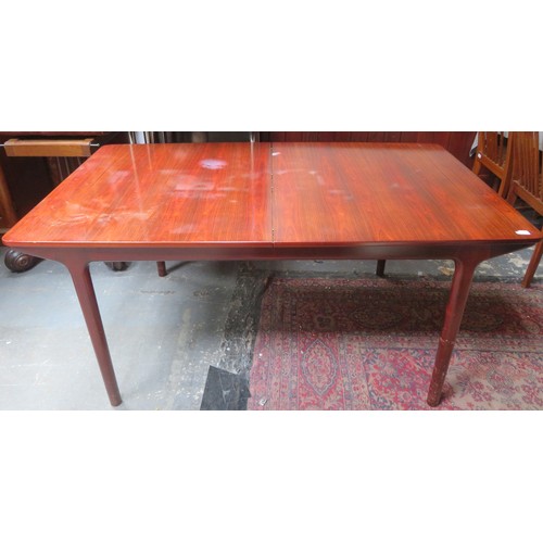 15 - McIntosh 20th century Rosewood extending dining table with two fold out leaves. Approximately. 74cm ... 