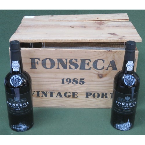 18 - Wooden crate containing Twelve unopened bottles of Fonseca Guimaraens 1985 vintage port