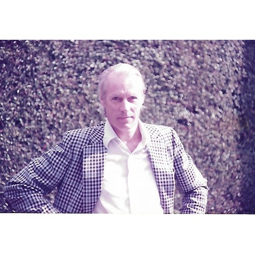 214 - Collection of seven colour photographs of George Martin taken by Geoff Emerick