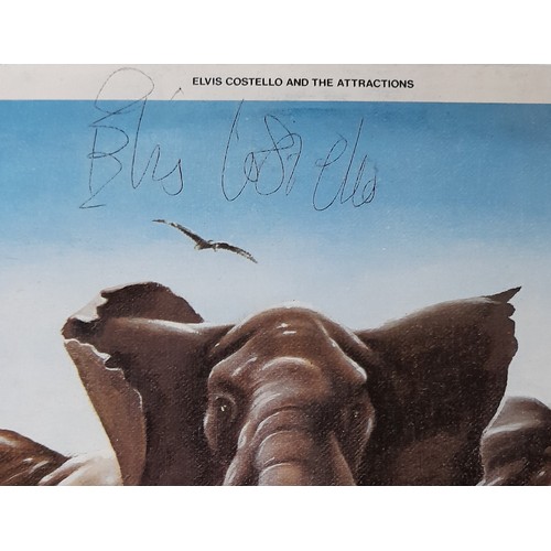 357 - Two signed by Elvis Costello albums Armed Forces and Get Happy with an Almost Blue promotional T-Shi... 