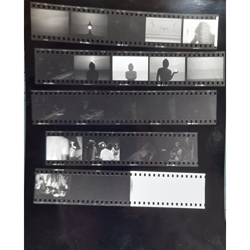 384 - Five contact sheets of photographs of unknown band with corresponding negatives