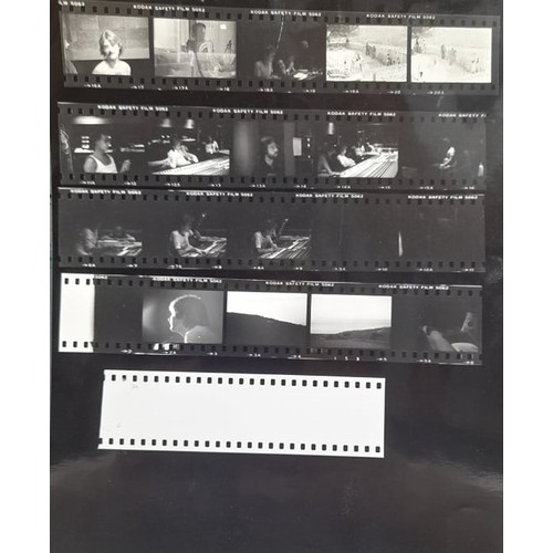 384 - Five contact sheets of photographs of unknown band with corresponding negatives